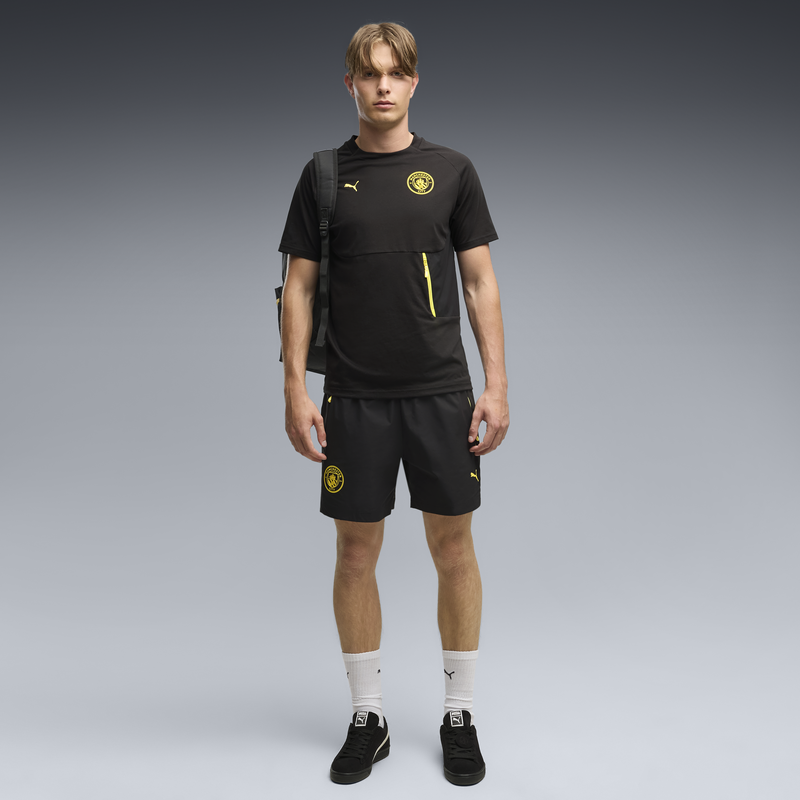 MCFC LW PUMATECH POCKET TEE - PUMA Black-Yellow Blaze
